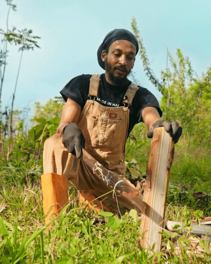 Sidney Etienne tending his Food forest in Haiti
